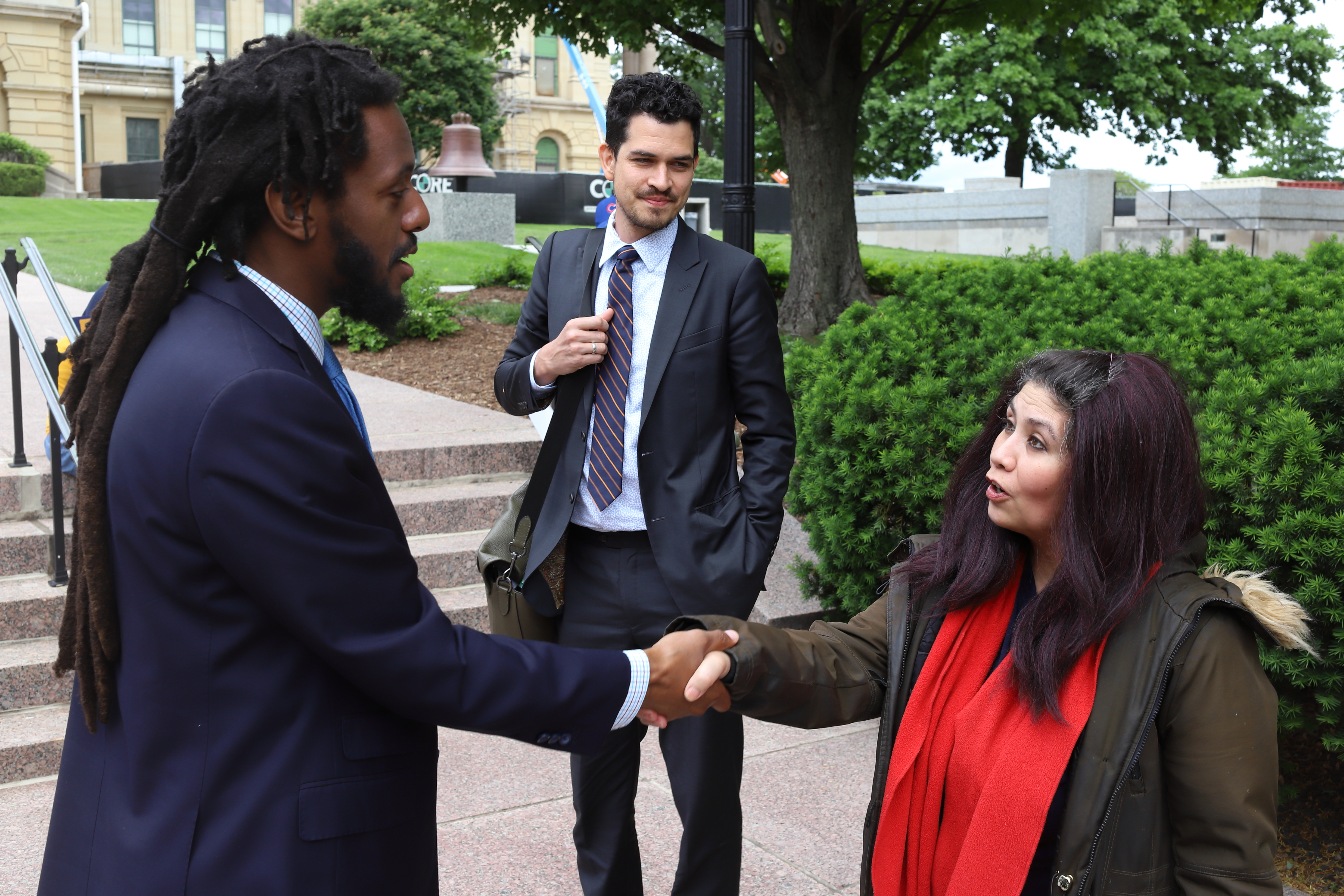 Senator Simmons shaking hands